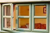 Dual_sage_green_upvc_casement_window