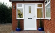 White composite front door with Cotswold glass and chrome handle and letterplate from the Anglian contemporary composite doors range