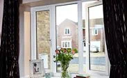 Double glazed UPVC casement windows finished in White Knight from the Anglian UPVC windows range
