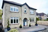 Whole house replacement double glazed UPVC casement windows in Cream from the Anglian double glazing range