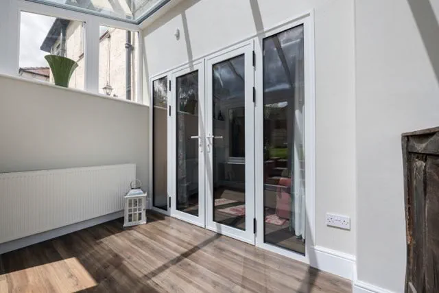 Aluminium French doors with side panel windows