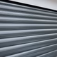 Load image into Gallery viewer, Compact Roller Garage Doors
