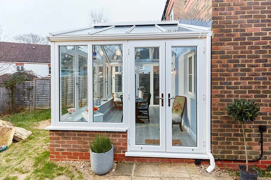 White uPVC regency concervatory with French doors front view