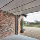 Load image into Gallery viewer, Wide Board Sectional Garage Doors

