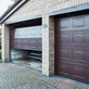 Load image into Gallery viewer, Georgian Sectional Garage Doors
